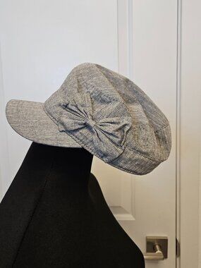 Gray stylish women's newsboy cap baker boy or cadet cap with bow